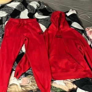 This is a red sweatsuit. It fits really comfortably I just don’t like red